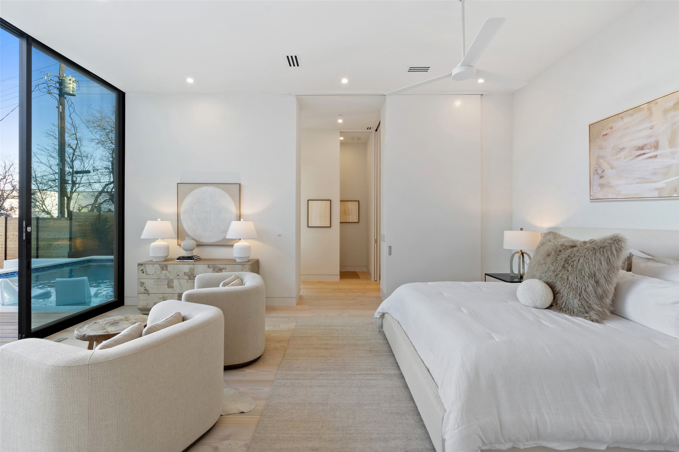 2605 Rockingham Drive Austin, TX 78704 - Photo 15 of 32 a bedroom with a bed and a chandelier