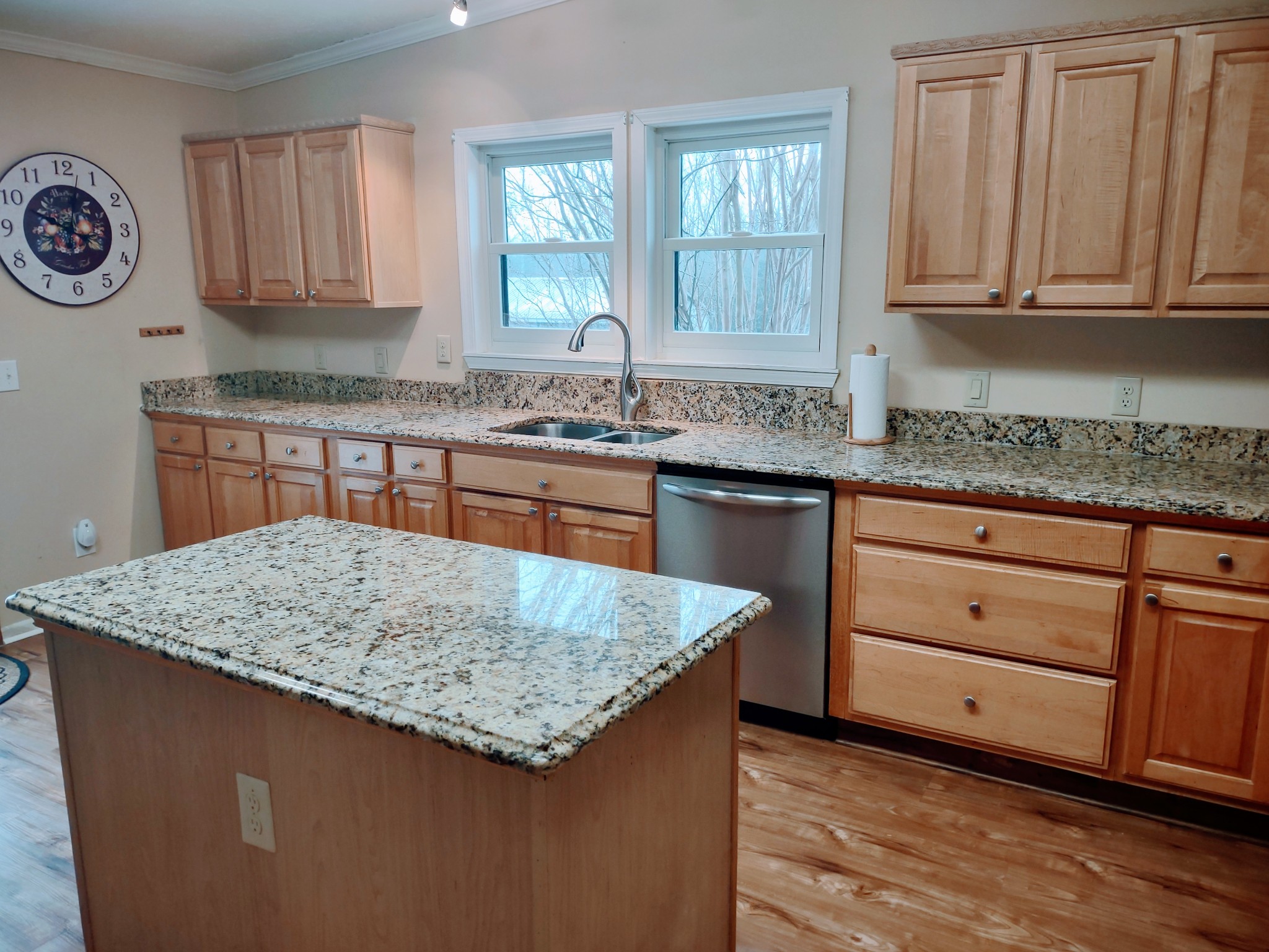6841 Bethel Road Goodlettsville, TN 37072 - Photo 14 of 27 a kitchen with granite countertop cabinets and window