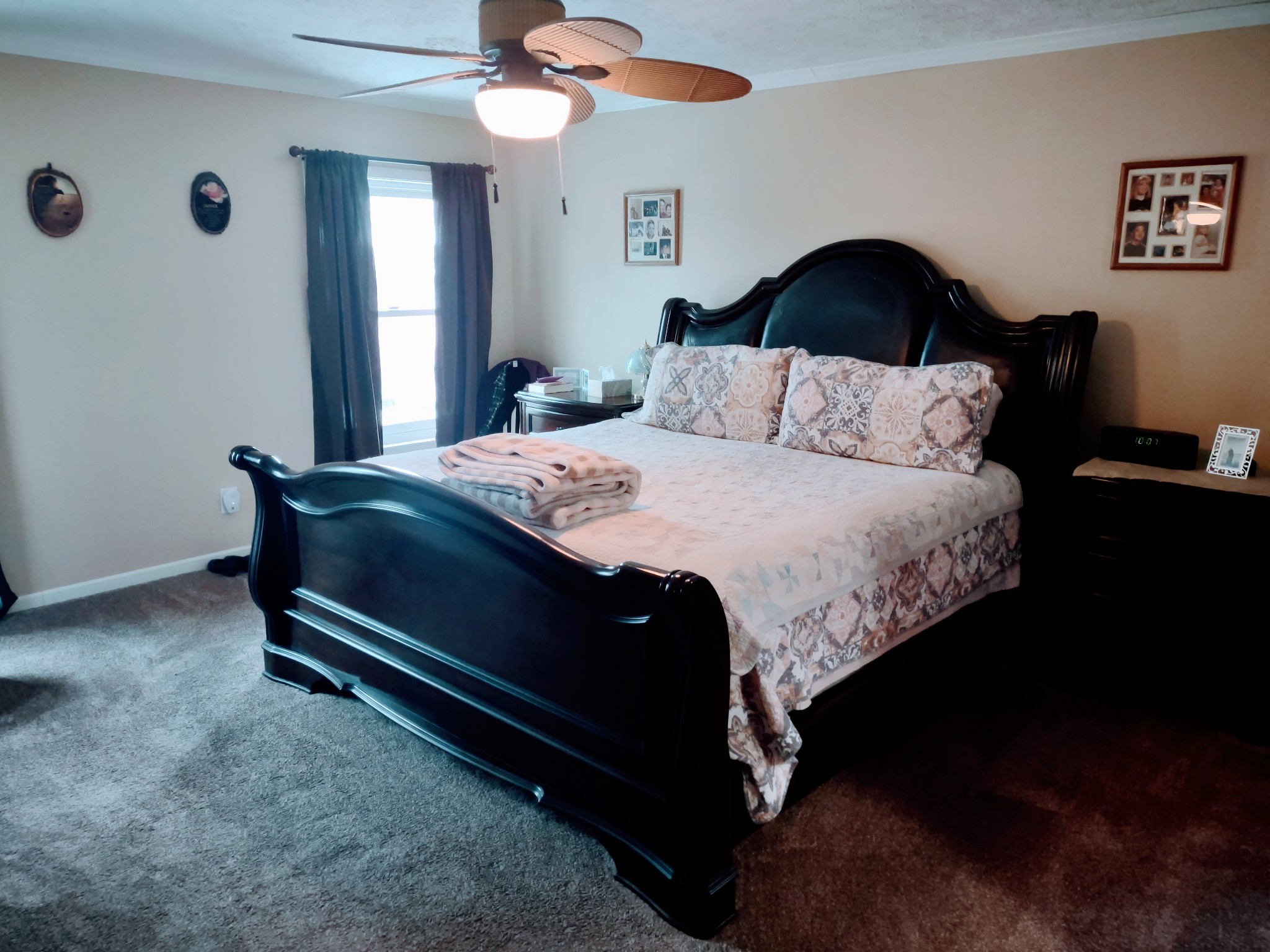 6841 Bethel Road Goodlettsville, TN 37072 - Photo 19 of 27 a bedroom with a bed lamp and a large window