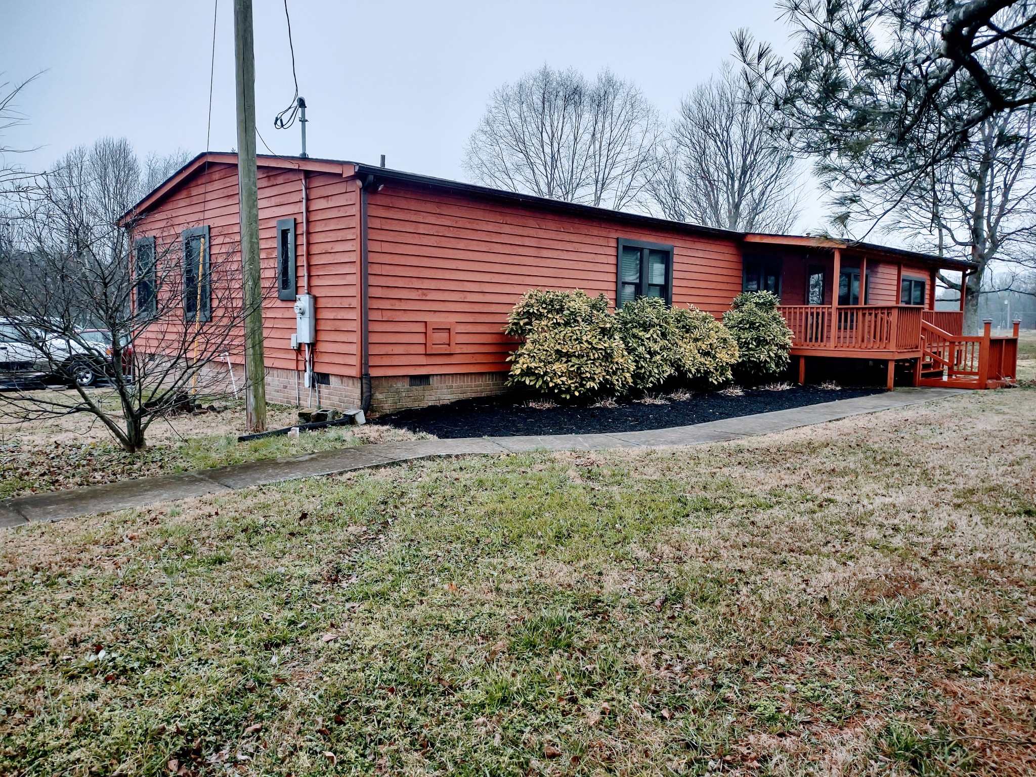 6841 Bethel Road Goodlettsville, TN 37072 - Photo 2 of 27 a front view of a house with garden