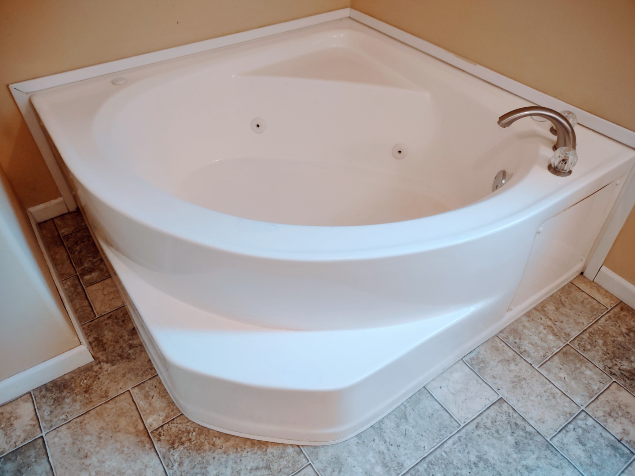 6841 Bethel Road Goodlettsville, TN 37072 - Photo 22 of 27 a view of a bathtub in a bathroom