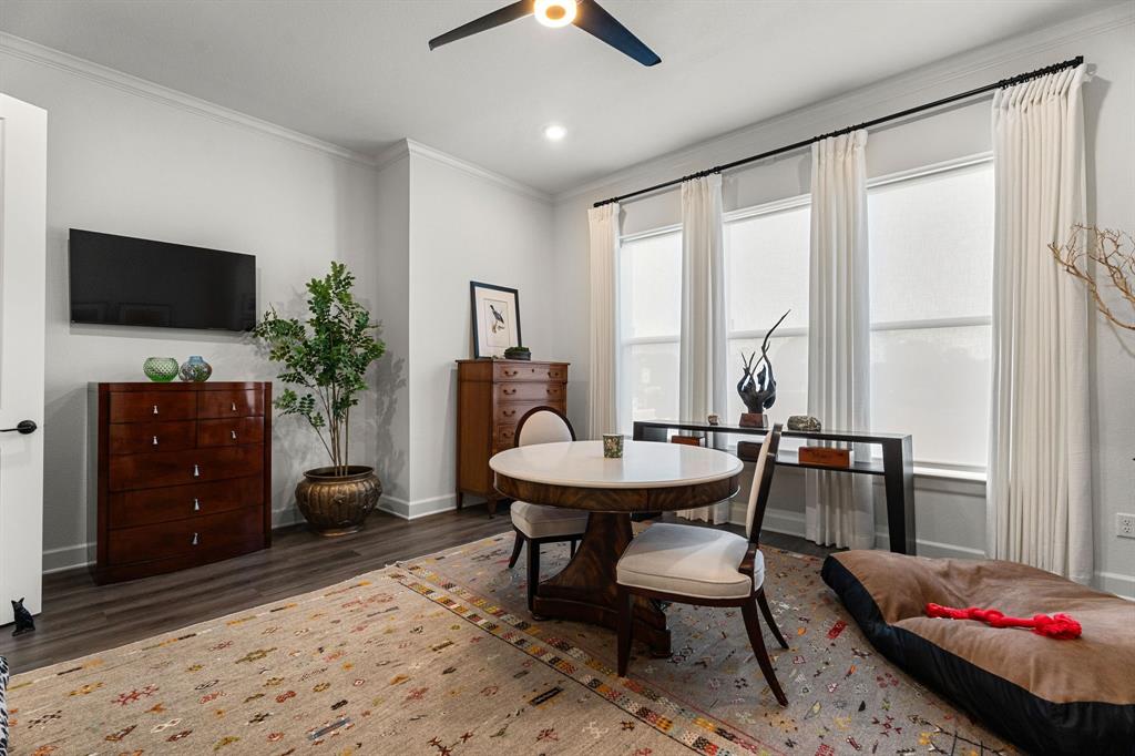 546 West Erwin Street Tyler, TX 75702 - Photo 23 of 29 a view of a livingroom with furniture and a flat screen tv