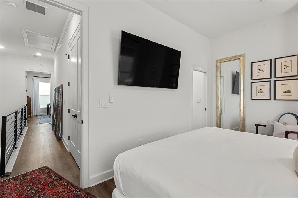 546 West Erwin Street Tyler, TX 75702 - Photo 26 of 29 a large white bed in a white room