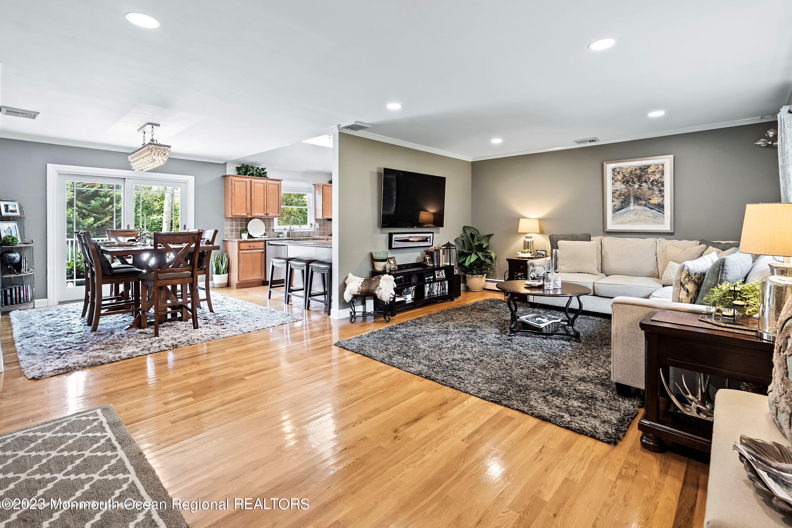 653 Carroll Fox Road Brick, NJ 08724 - Photo 36 of 48 a living room with furniture and a flat screen tv