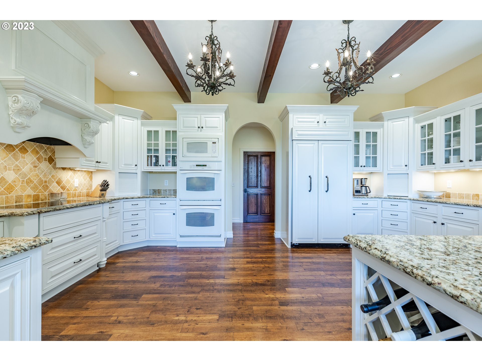 86705 Pine Grove Road Eugene, OR 97402 - Photo 25 of 48 a kitchen with stainless steel appliances granite countertop a stove and cabinets