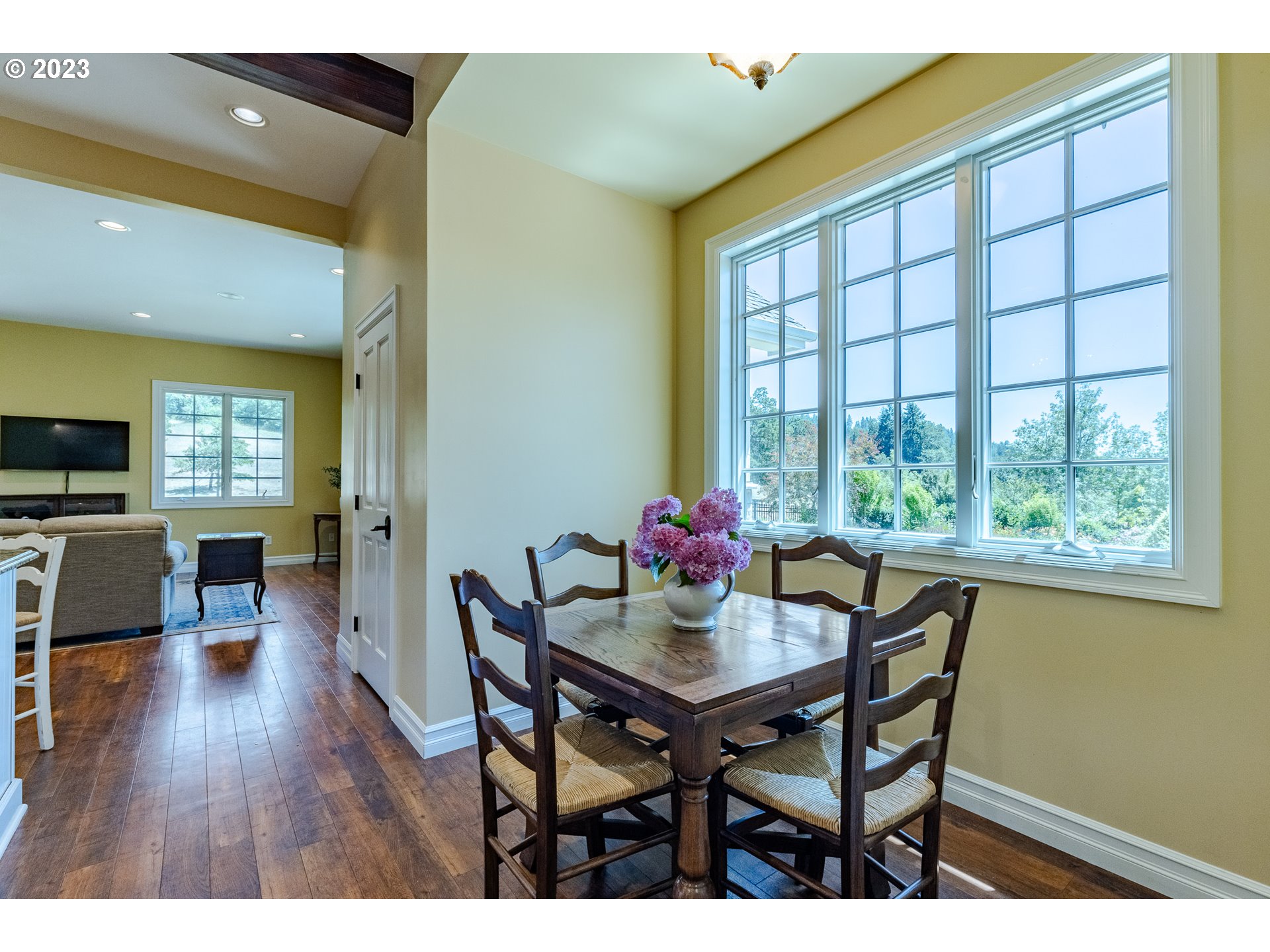 86705 Pine Grove Road Eugene, OR 97402 - Photo 27 of 48 a view of a dining room with furniture and a window