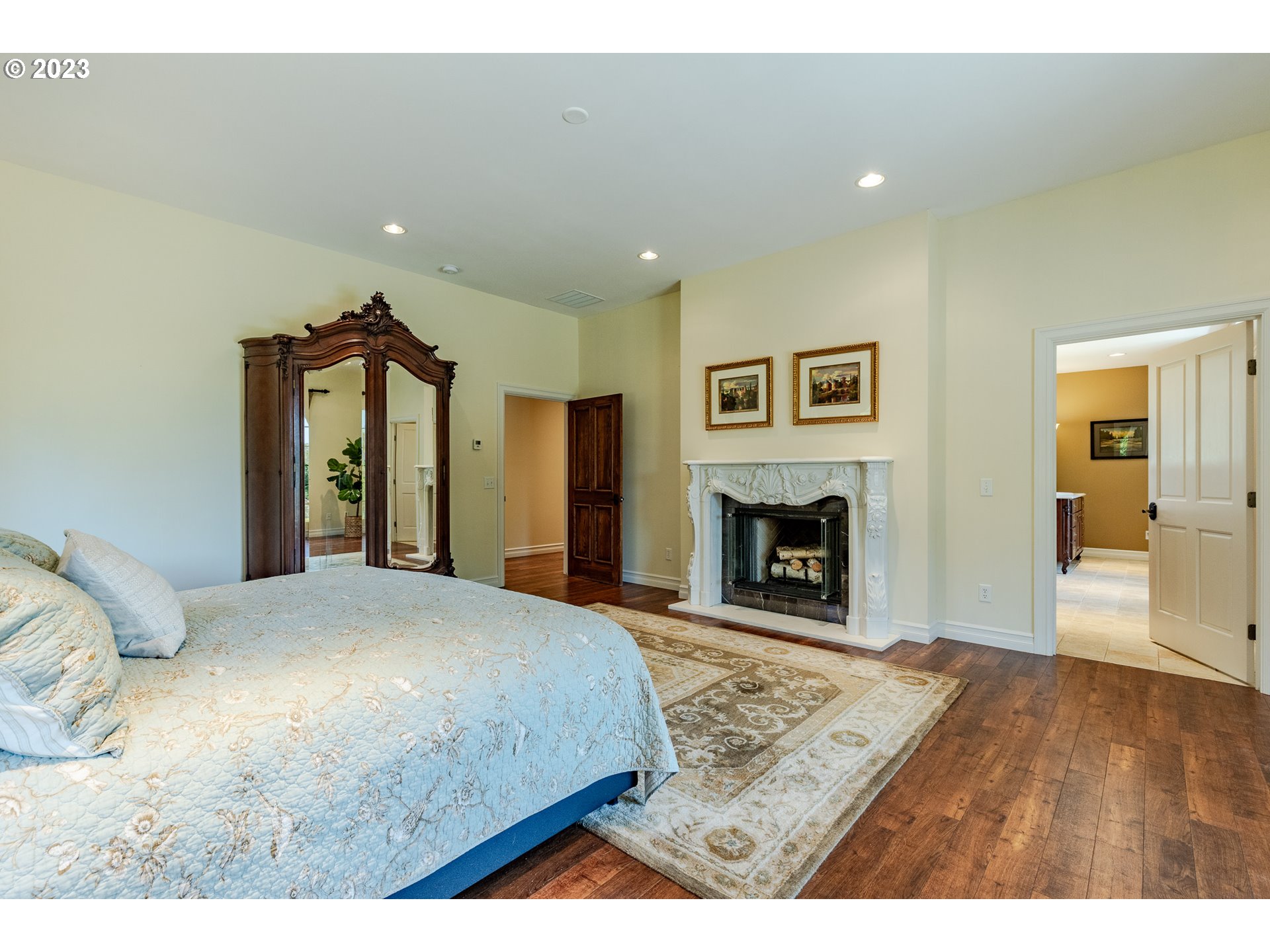 86705 Pine Grove Road Eugene, OR 97402 - Photo 40 of 48 a bedroom with a bed and a fireplace