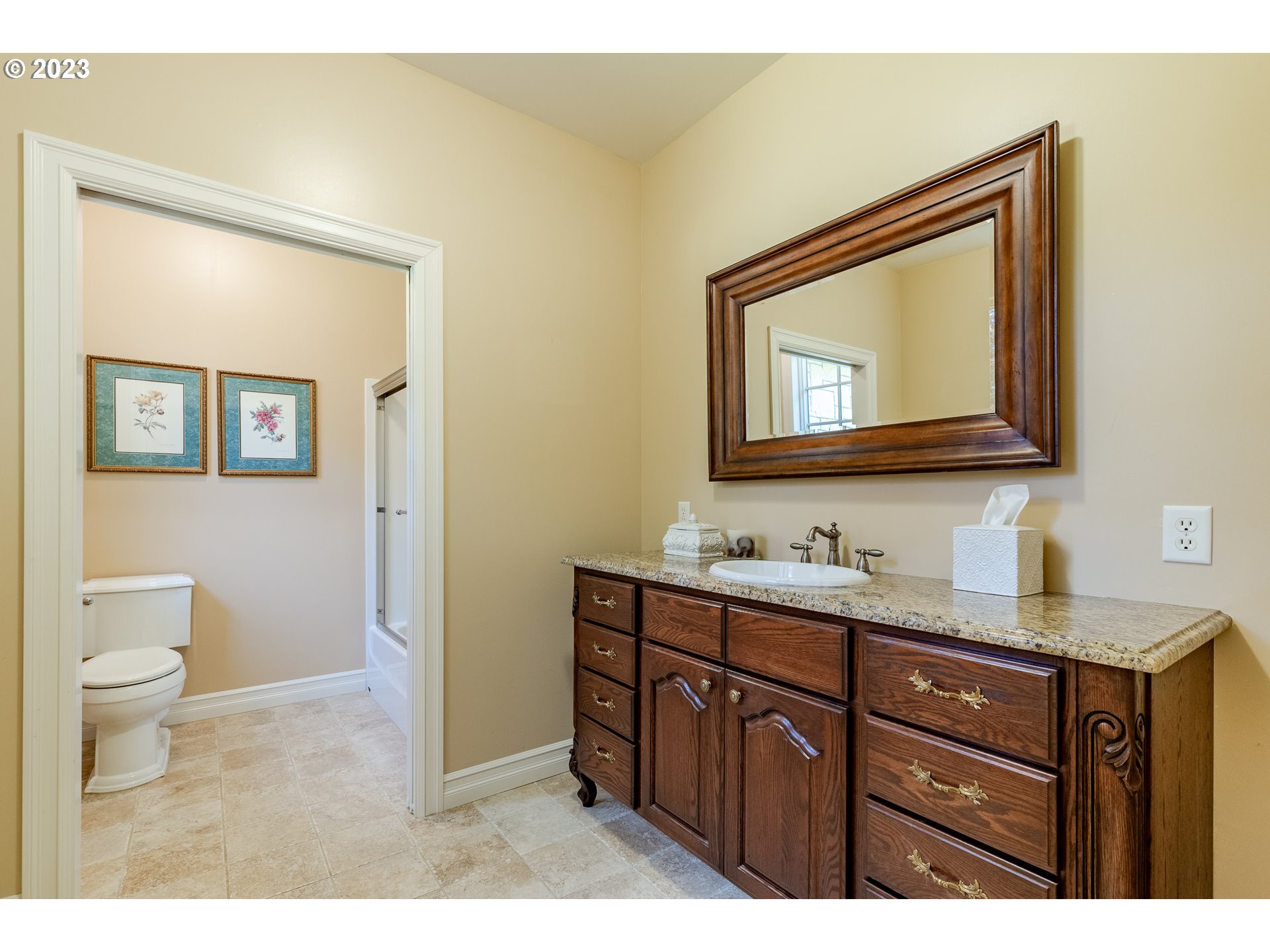 86705 Pine Grove Road Eugene, OR 97402 - Photo 48 of 48 a bathroom with a toilet a sink a vanity and mirror