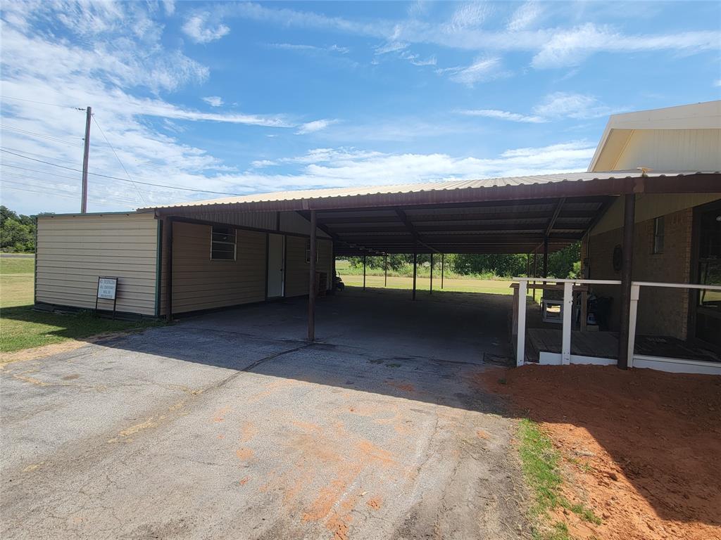 215 Cedar Court Graham, TX 76450 - Photo 3 of 39 Carport