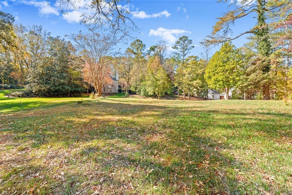 1099 Burnt Hickory Road Northwest Marietta, GA 30064 - Photo 13 of 17 a view of a green field
