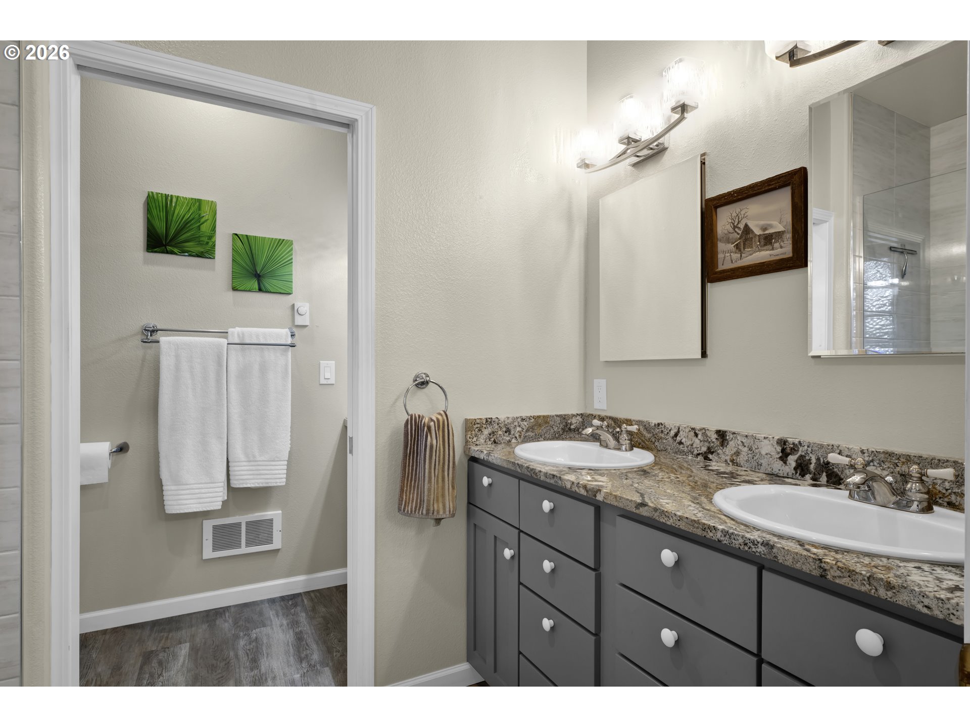 109 Ocean View Court Florence, OR 97439 - Photo 24 of 48 a bathroom with a granite countertop sink mirror and vanity
