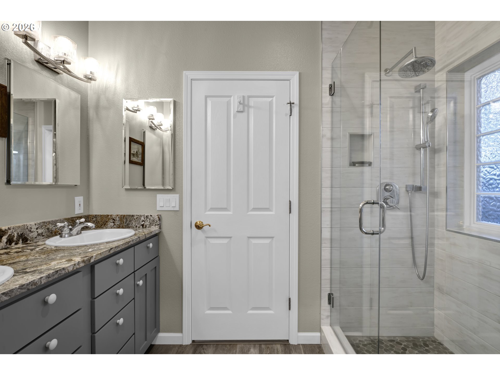 109 Ocean View Court Florence, OR 97439 - Photo 25 of 48 a bathroom with a shower sink and mirror
