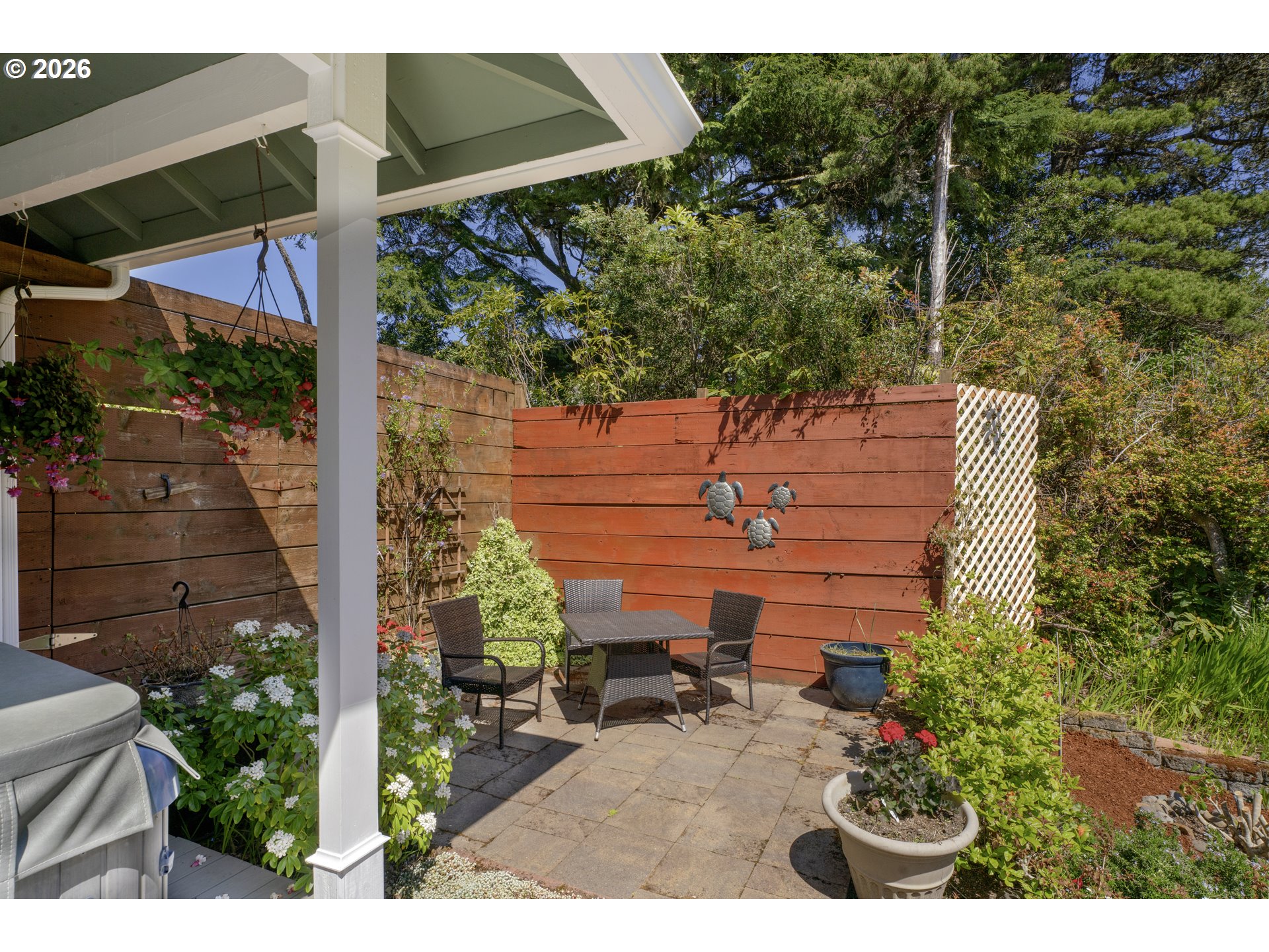 109 Ocean View Court Florence, OR 97439 - Photo 41 of 48 a backyard of a house with lots of green space