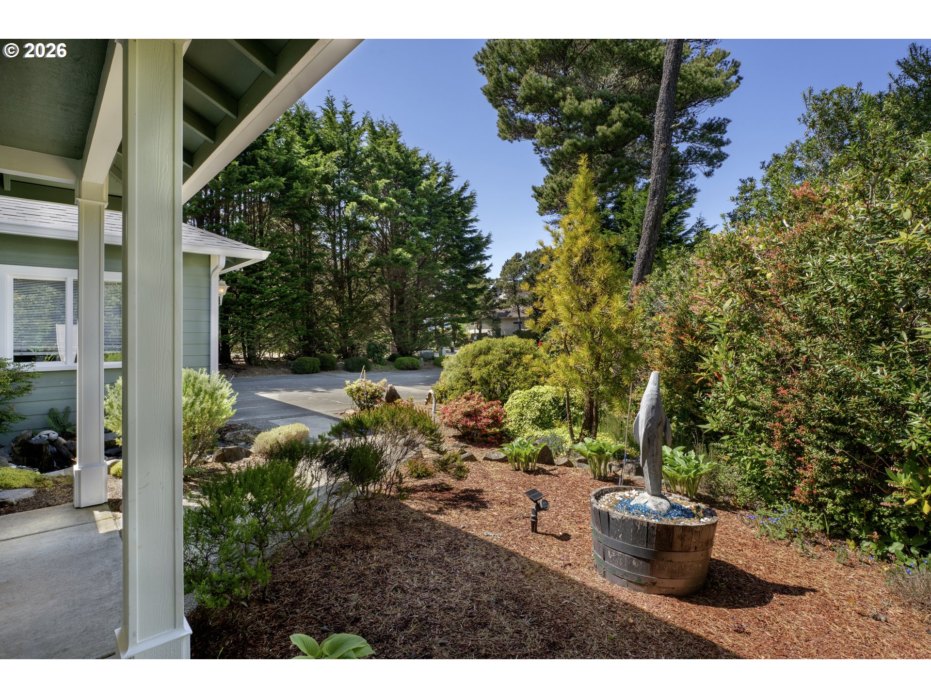 109 Ocean View Court Florence, OR 97439 - Photo 5 of 48 a view of a backyard of the house