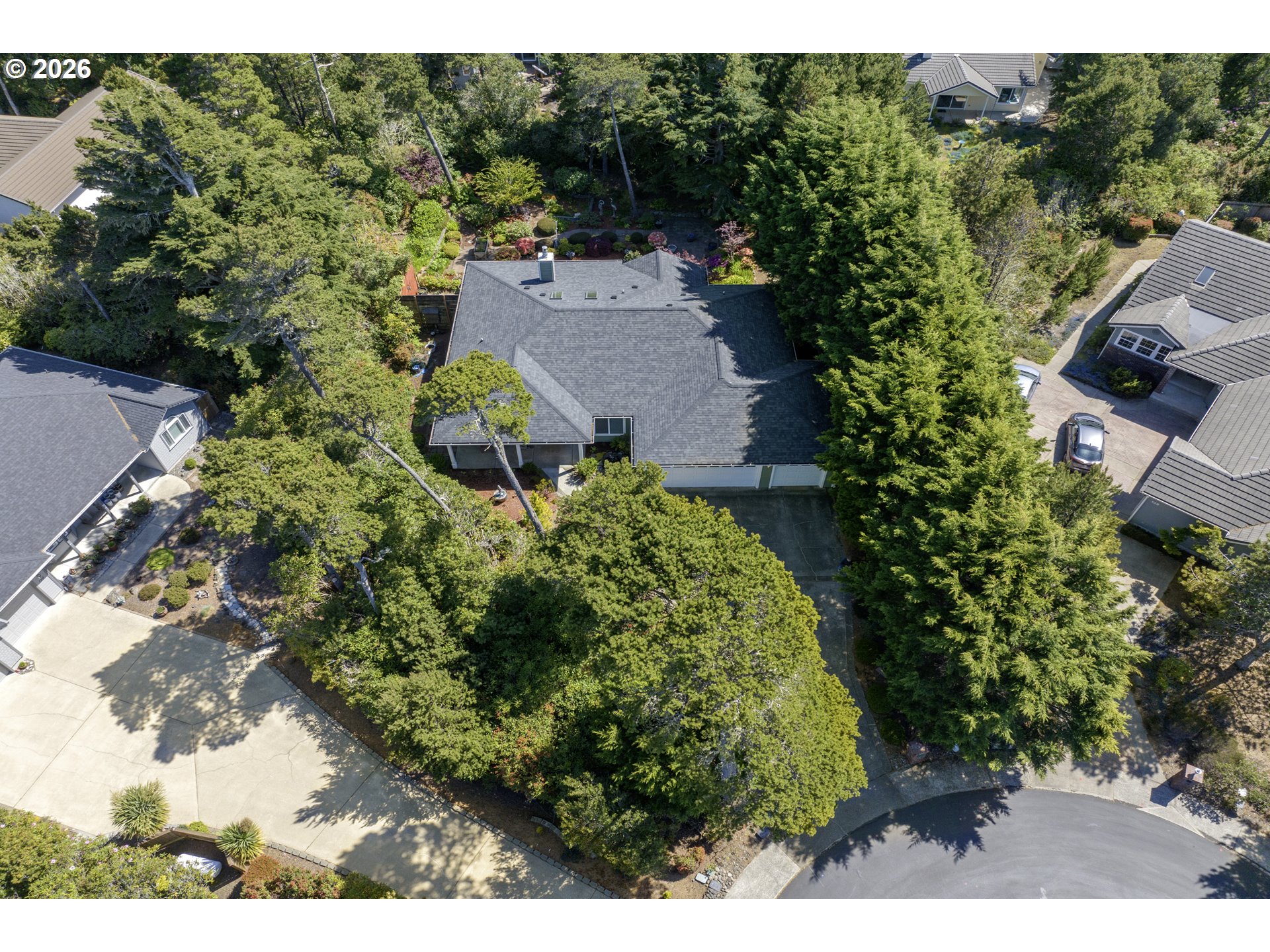 109 Ocean View Court Florence, OR 97439 - Photo 6 of 48 an aerial view of a house with a yard