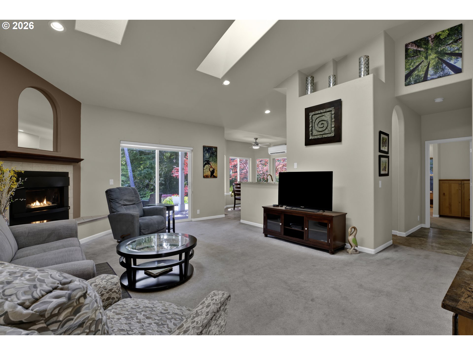 109 Ocean View Court Florence, OR 97439 - Photo 9 of 48 a living room with furniture a flat screen tv and a fireplace