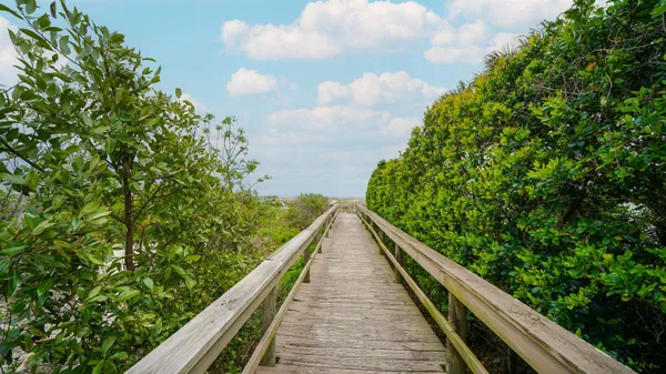 a view from balcony with wooden floor