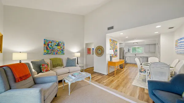 a living room with furniture and a table