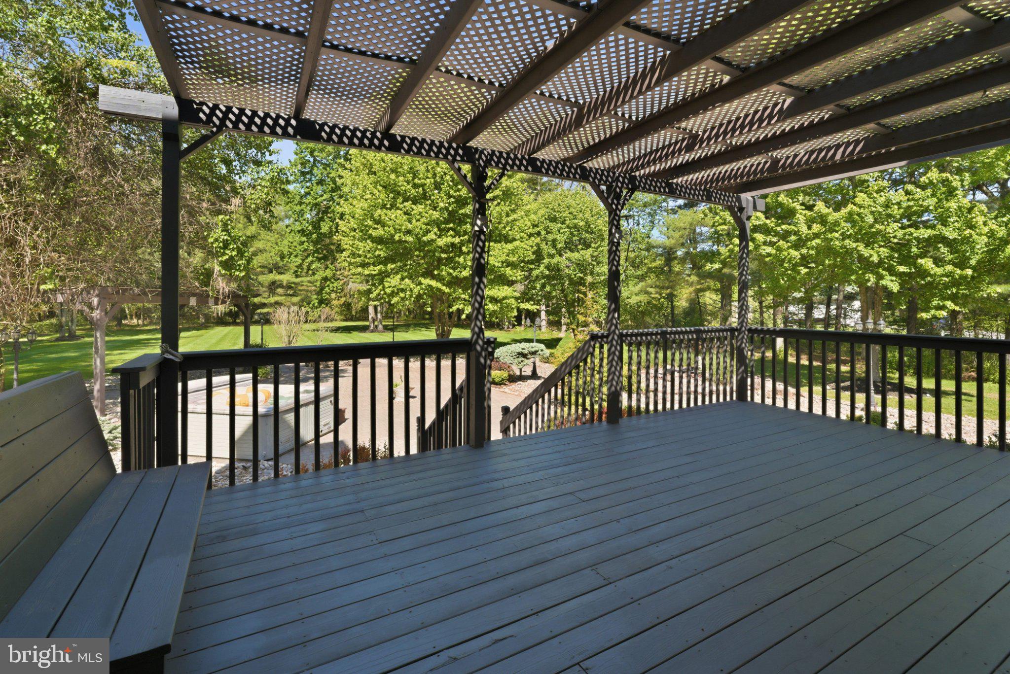 97 Union Road Frenchtown, NJ 08825 - Photo 104 of 112 Serene deck overlooking lush greenery.