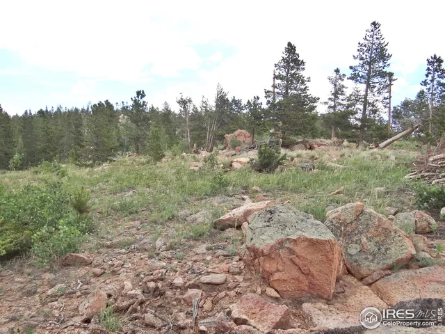 a view of a entryway with wooden floor
