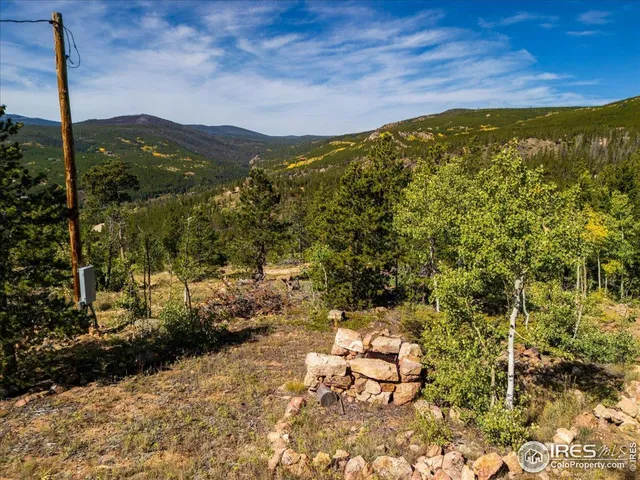 a view of a city with mountains in the background