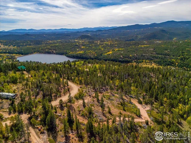 a view of lake and mountain