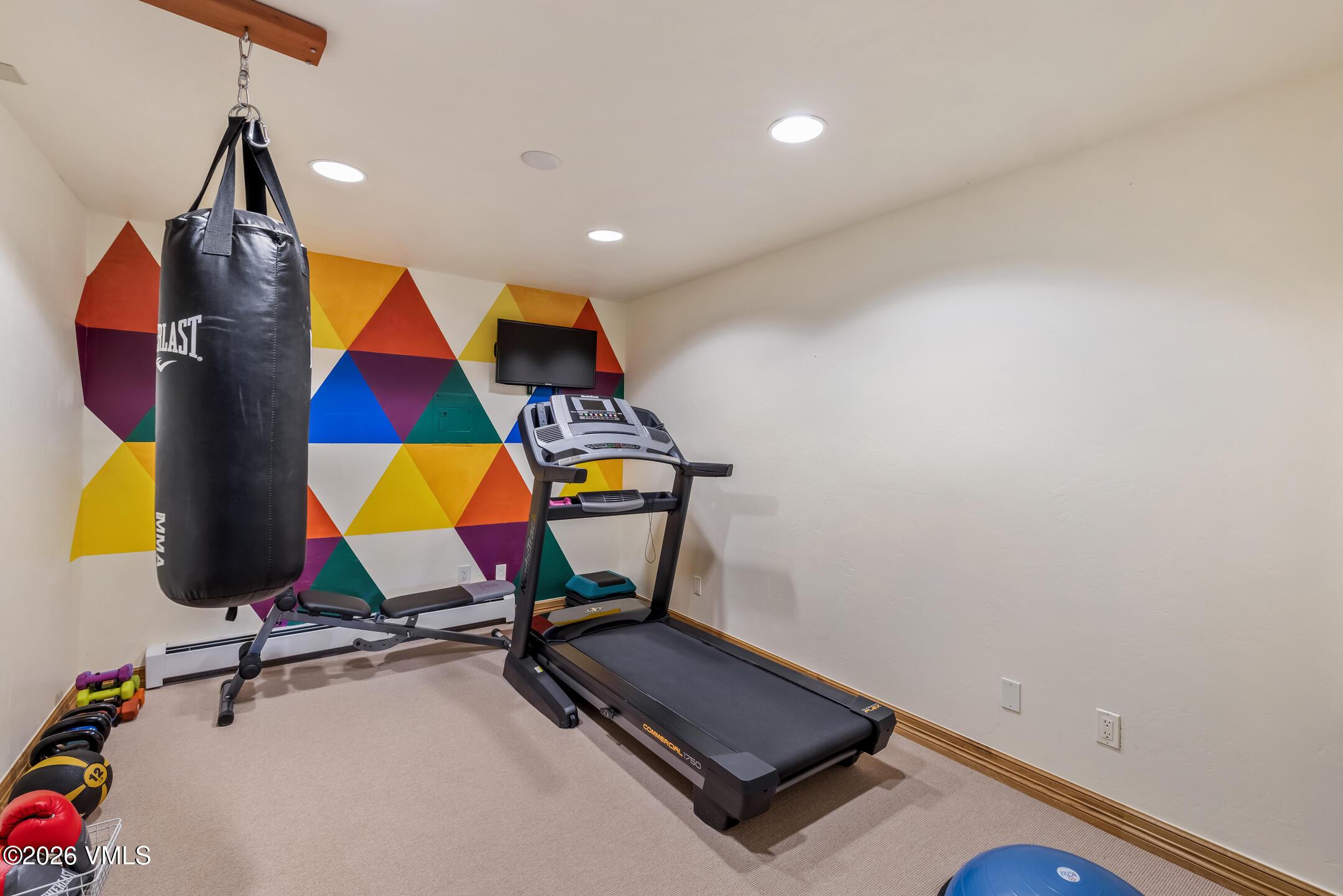 321 Meile Lane Edwards, CO 81632 - Photo 26 of 44 a room with gym equipment and mirrors