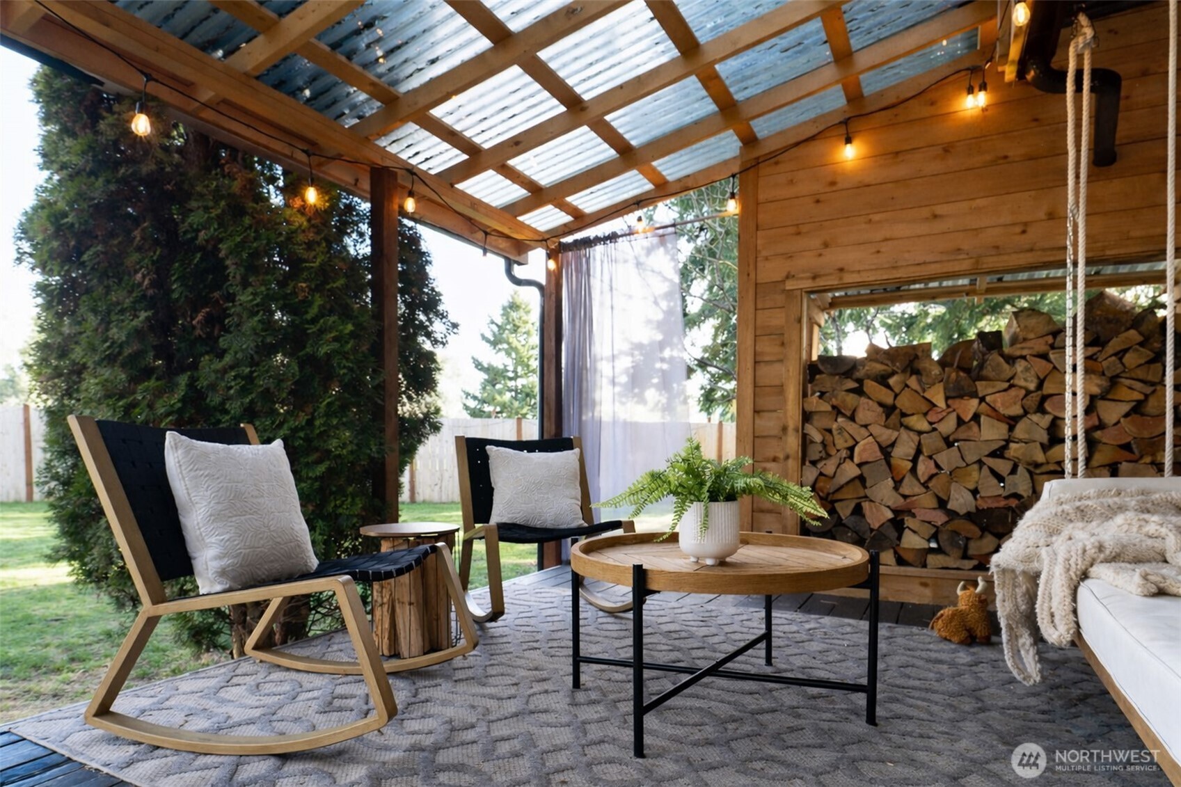 9405 Bridge Road Southeast Yelm, WA 98597 - Photo 31 of 37 a outdoor living space with furniture and a potted plant