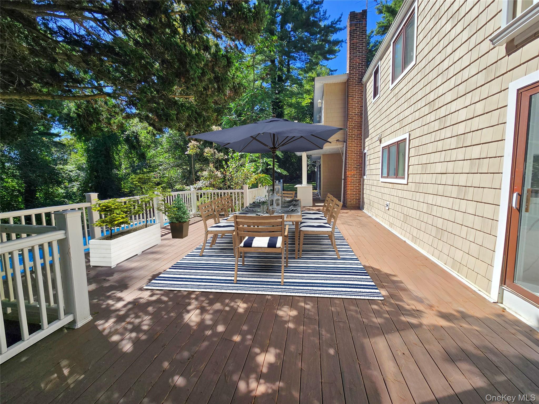 32 Valley Road Old Westbury, NY 11568 - Photo 13 of 45 Deck featuring outdoor dining space
