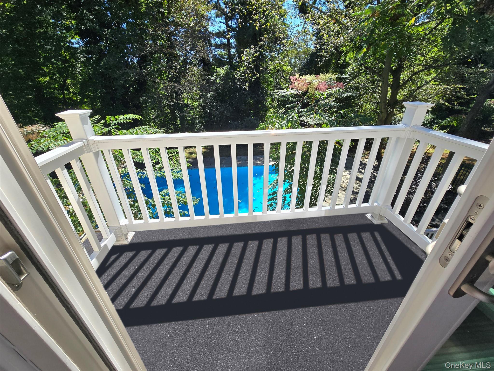 32 Valley Road Old Westbury, NY 11568 - Photo 14 of 45 Balcony featuring view of wooded area