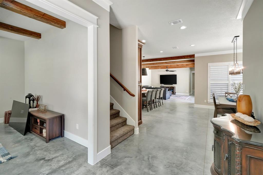 516 West Spring Street Weatherford, TX 76086 - Photo 12 of 39 a view of a livingroom with furniture and a flat screen tv