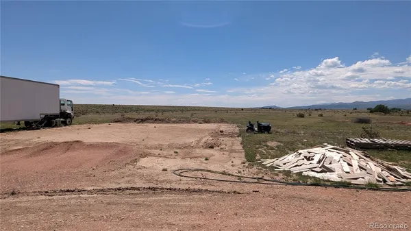 a view of a lake with beach