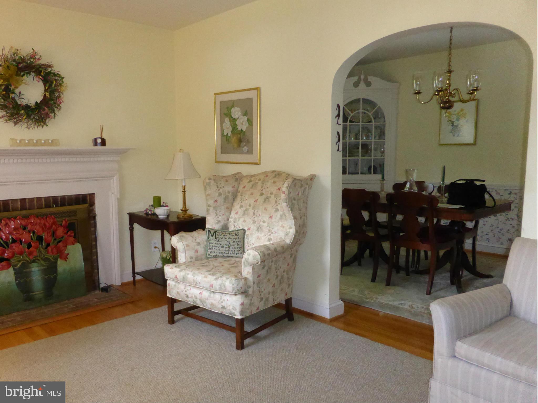 733 Anneslie Road Baltimore, MD 21212 - Photo 6 of 11 a living room with furniture and a fireplace
