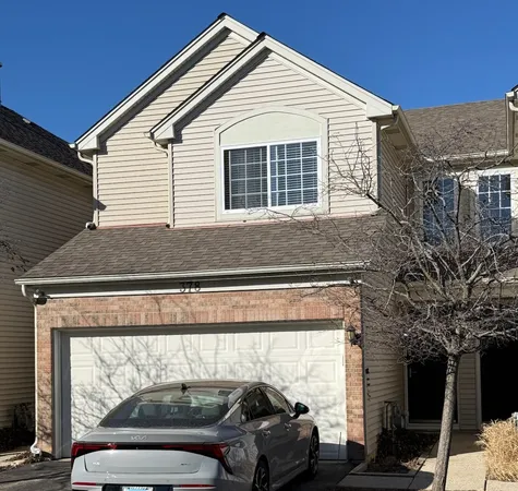 a car parked in front of a house