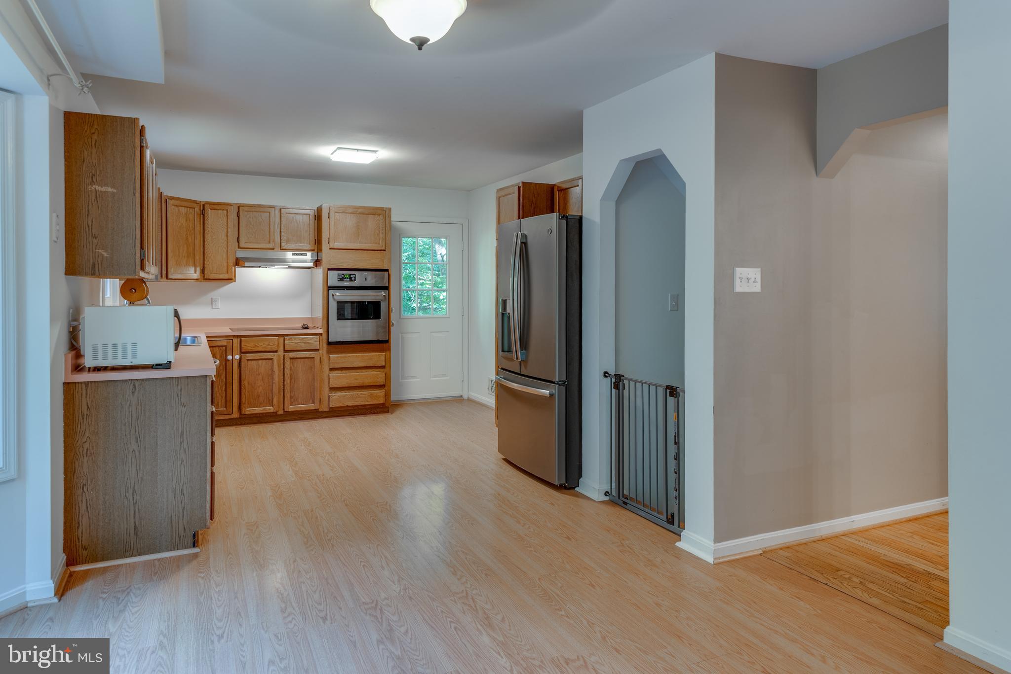 8413 Manor View Road Lusby, MD 20657 - Photo 12 of 48 a view of kitchen with wooden floor