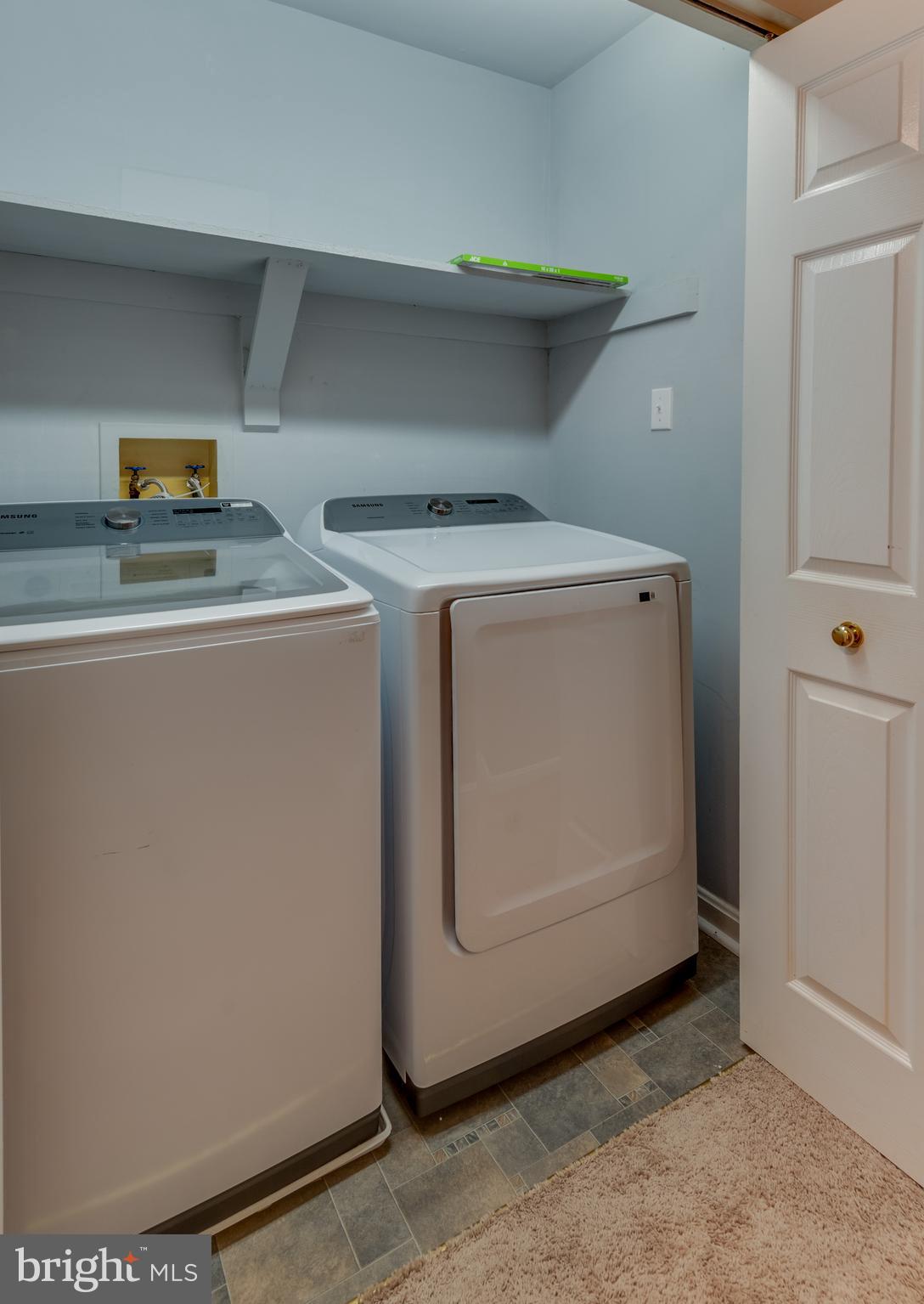 8413 Manor View Road Lusby, MD 20657 - Photo 18 of 48 a utility room with dryer and washer