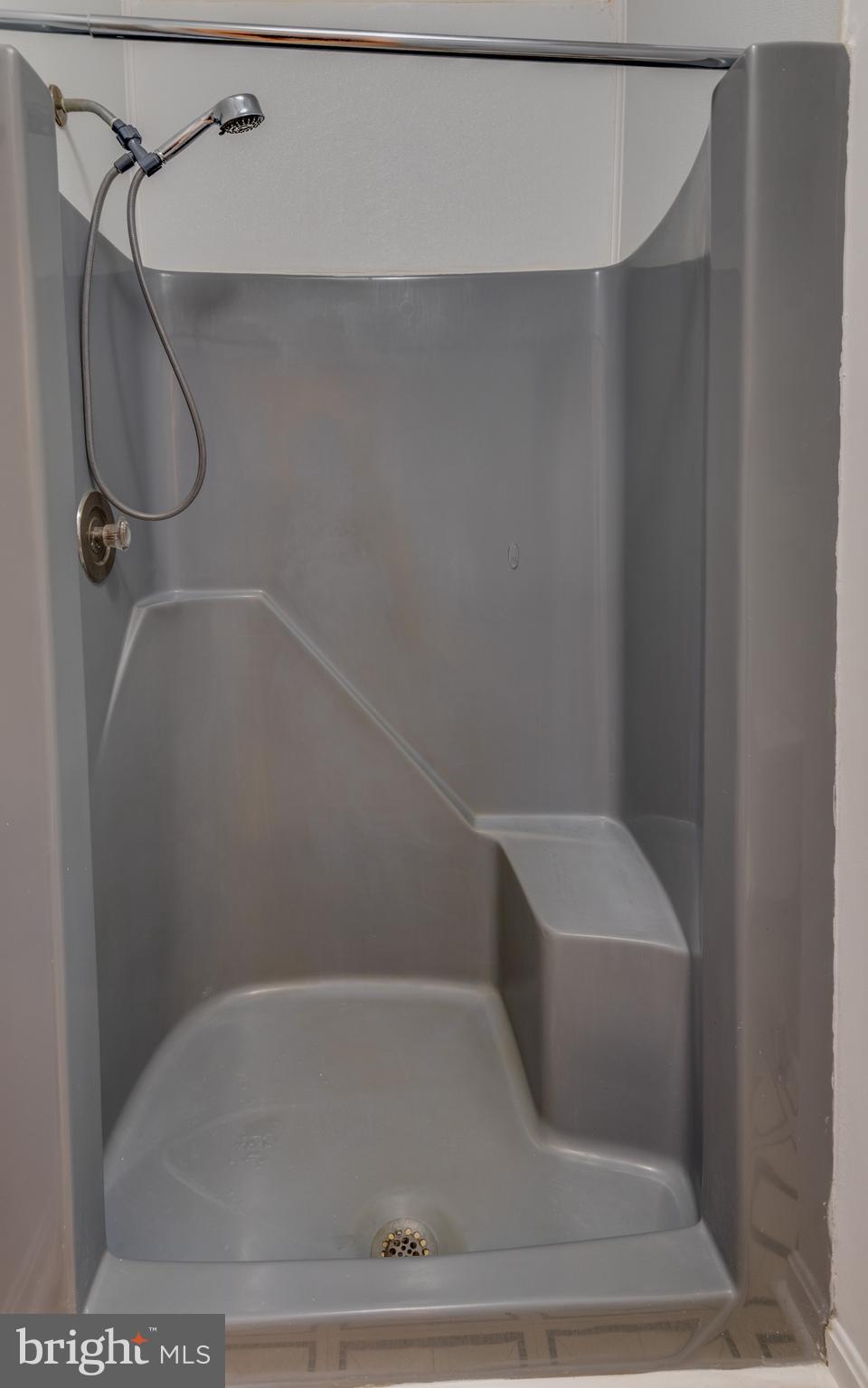 8413 Manor View Road Lusby, MD 20657 - Photo 24 of 48 a bathroom with a shower