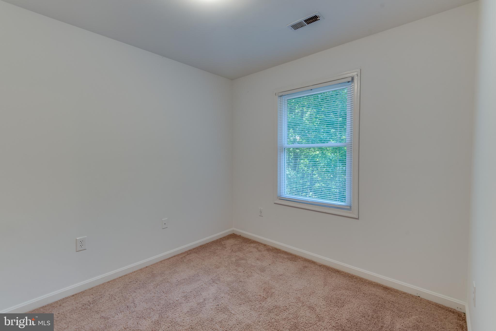 8413 Manor View Road Lusby, MD 20657 - Photo 31 of 48 an empty room with a window