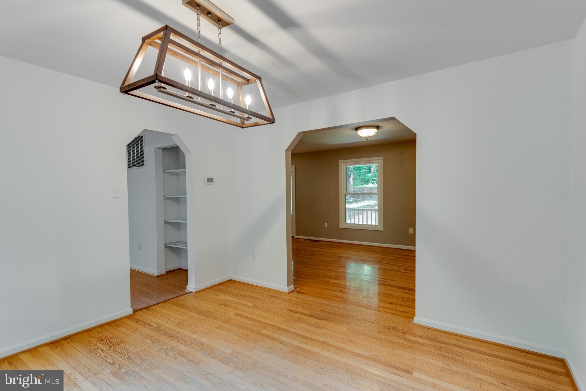 8413 Manor View Road Lusby, MD 20657 - Photo 10 of 48 a view of empty room with wooden floor