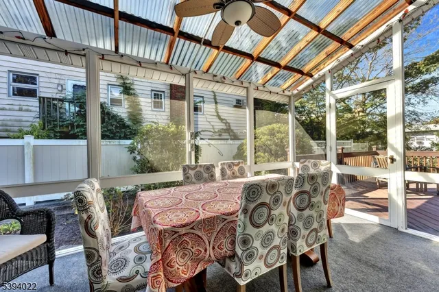 a view of an outside dining space with furniture window