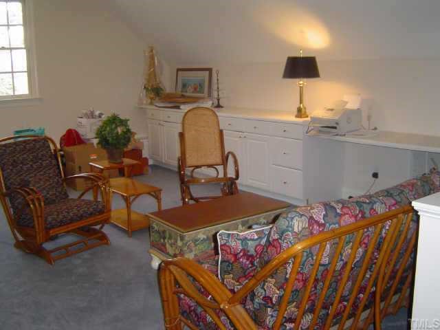 2209 St Marys Street Raleigh, NC 27608 - Photo 8 of 10 a living room with furniture and a flat screen tv