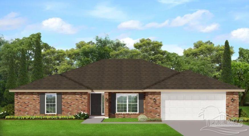 5226 Muscadine Way Milton, FL 32570 - Photo 1 of 2 a front view of a house with garden