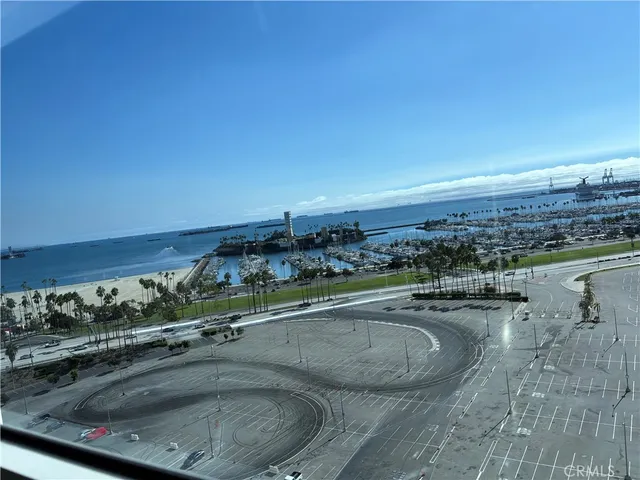 view of a swimming pool and an ocean view