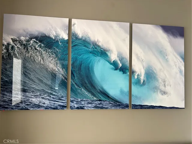 a water heater on the side of a stove