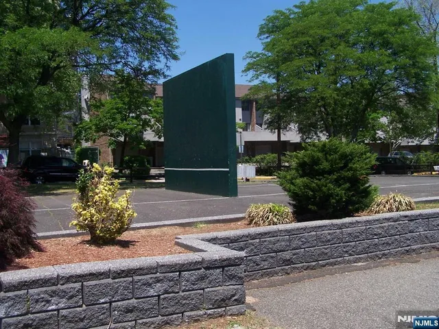 a view of backyard with sitting area