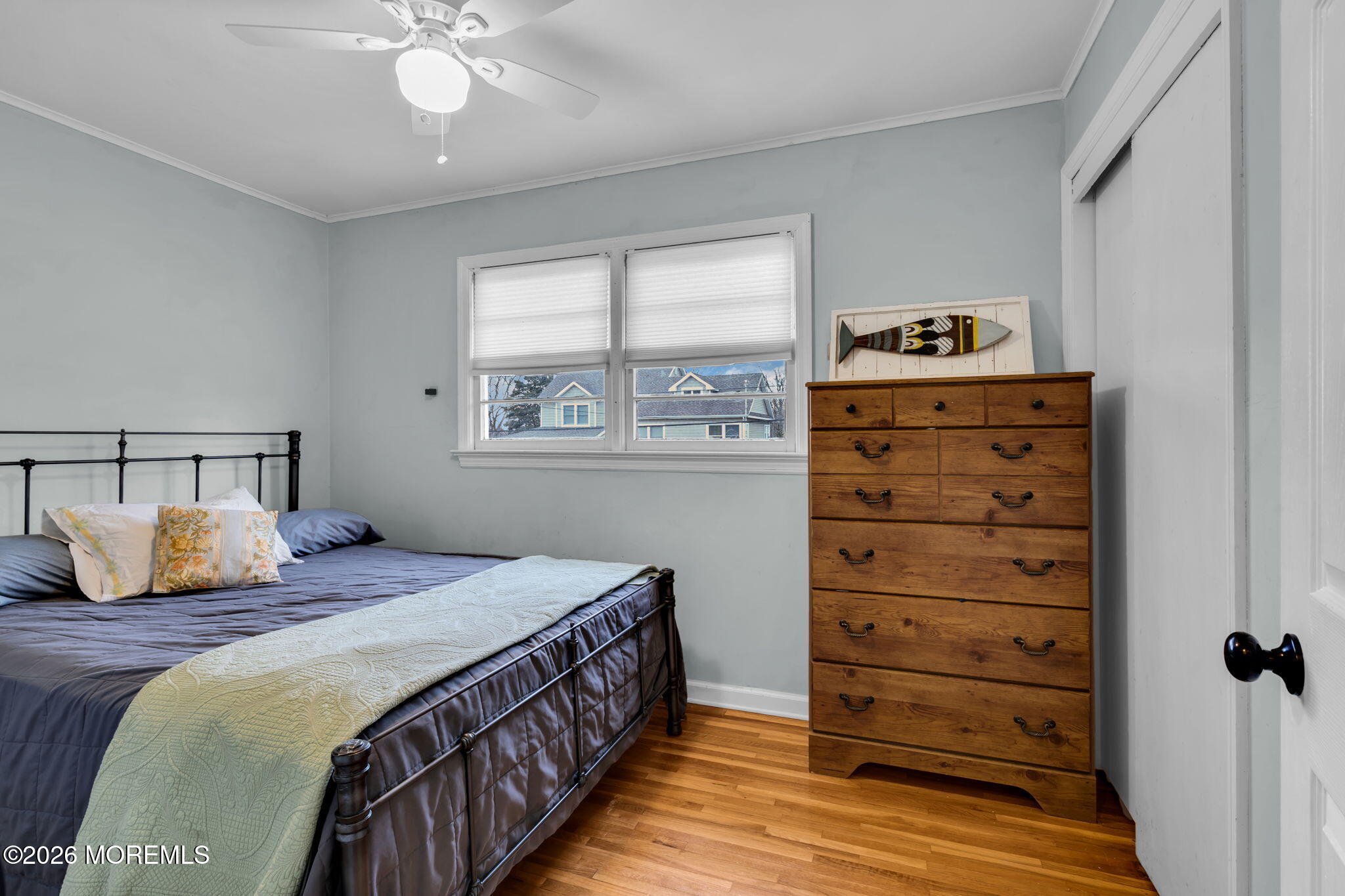 38 Hilltop Road West Long Branch, NJ 07764 - Photo 18 of 28 a bedroom with a bed a dresser and a window