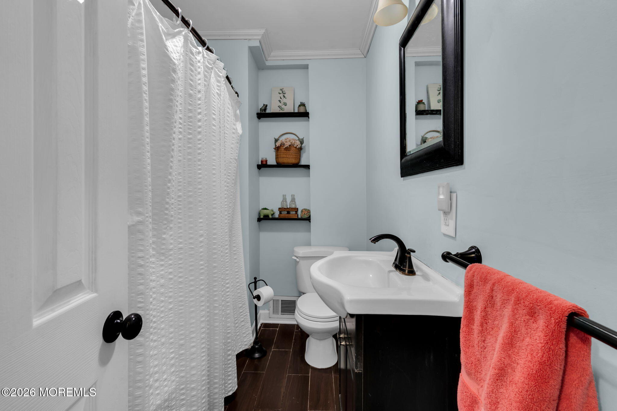 38 Hilltop Road West Long Branch, NJ 07764 - Photo 21 of 28 a bathroom with a sink and a mirror