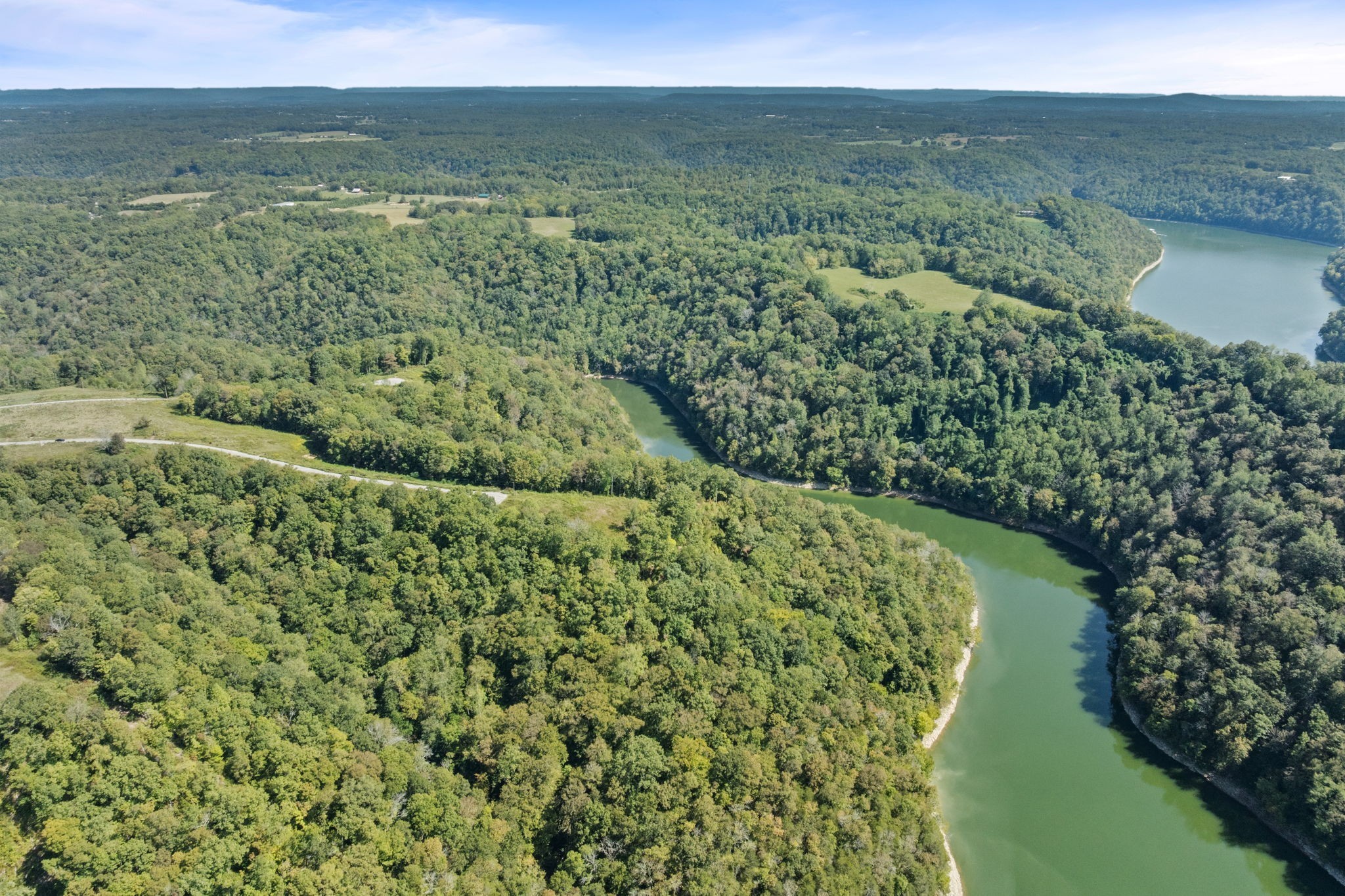 0 Eli Lane Baxter, TN 38544 - Photo 4 of 15 a view of a lake with a yard