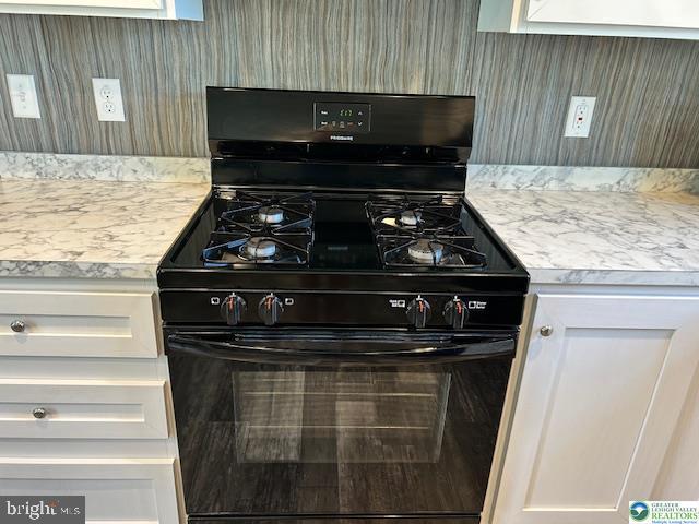 8220 Airport Road Bath, PA 18014 - Photo 11 of 25 a stove top oven sitting inside of a kitchen