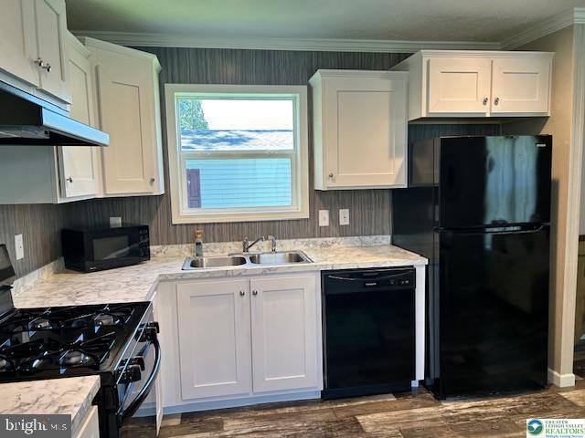 8220 Airport Road Bath, PA 18014 - Photo 12 of 25 a kitchen with granite countertop a sink stove and refrigerator